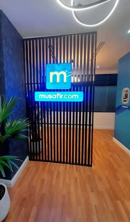 Branded office reception fit-out by a Malaz-based contractor